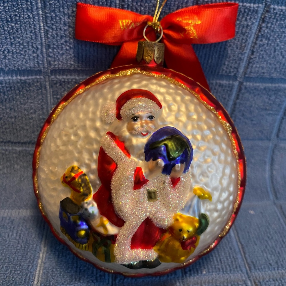 Waterford Christmas ornament. Sweet Santa and his sack full of toys!